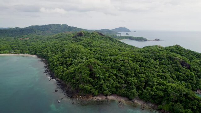 A 4K drone shot of Punta Sabana Point and the Mirador Conchal Peninsula next to Puerto Viejo and Playa Conchal, or &ldquo;Shell Beach&rdquo;, along the north-western coast of Costa Rica.