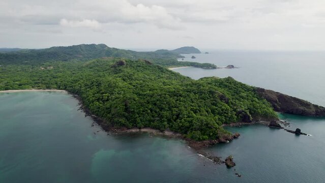 A 4K drone shot of Punta Sabana Point and the Mirador Conchal Peninsula next to Puerto Viejo and Playa Conchal, or &ldquo;Shell Beach&rdquo;, along the north-western coast of Costa Rica.