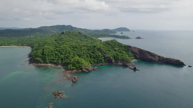 A 4K drone shot of Punta Sabana Point and the Mirador Conchal Peninsula next to Puerto Viejo and Playa Conchal, or &ldquo;Shell Beach&rdquo;, along the north-western coast of Costa Rica.
