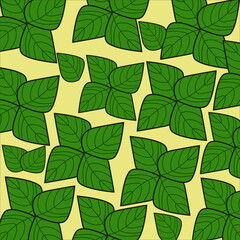 The pattern is green leaves on a yellow background