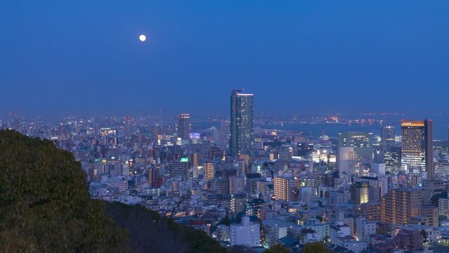 神戸の夜景と満月（タイムラプス・フィックス）　神戸市中央区諏訪山公園ビーナスブリッジからの眺め