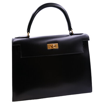 Hermès Kelly handbag, black box calf, gold hardware.