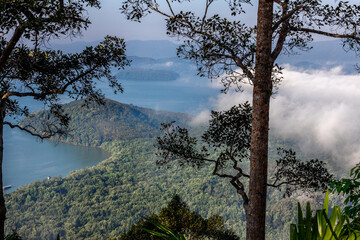 high angle nature background On the mountain overlooking the surrounding natural scenery, overlooking the sea, trees, rocks, trees, adventure tourism.