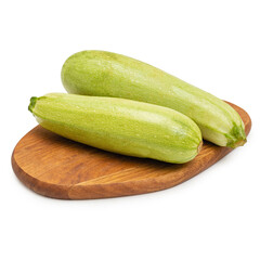 Fresh zucchini on a wooden board, on a white background, isolate