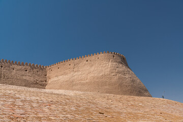 Fototapeta na wymiar Walls and bastion of the ancient fortress Kuhna Ark, Khiva, Uzbekistan