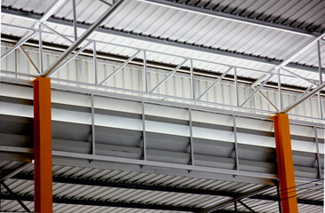 warehouse interior steel structure using geometric shape making abstract pattern for roof top and coy space