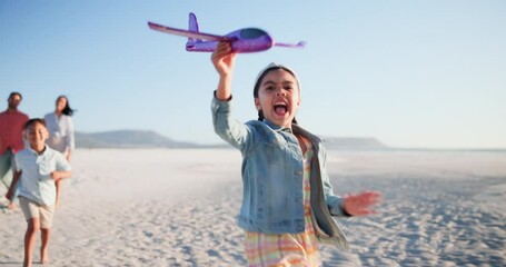 Family, parents and kids on beach with plane for playing, relax and bonding on holiday or vacation. Travel, man and woman with children by ocean or sea for summer, adventure or experience with happy - Powered by Adobe