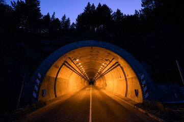 highway tunnel entrance at night