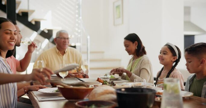Big family, dinner and happy at dining table with food for bonding, event or conversation in living room of home. Love, grandparents and parents with children for lunch, supper or brunch with talking