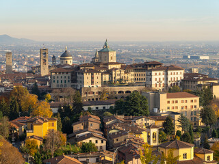 Fototapeta na wymiar Bergamo. One of the beautiful city in Italy. Morning landscape at the old town from Saint Vigilio hill during fall season