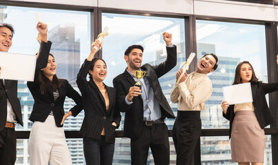 Success business group celebrating after meeting, Businesspeople with certificate in the office