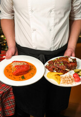 chef holding food for dinner