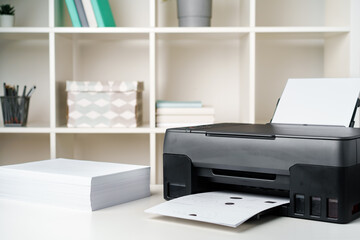Close up printer copier device on table in the office