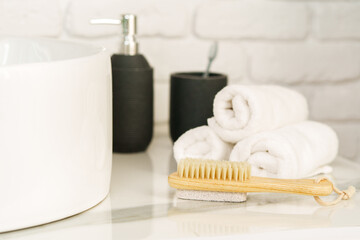 Stack of white towels in the bathroom
