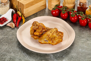 Roasted chicken leg with spices