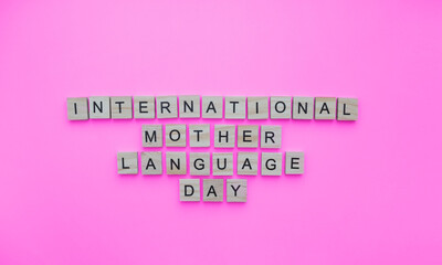 February 21, International Mother Language Day, minimalistic banner with the inscription in wooden letters