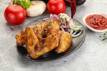 Grilled chicken wings with sauce
