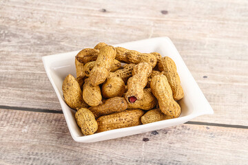 Raw ripe unpeeled peanut heap