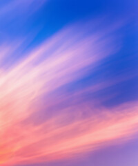 Obraz premium Sky midday sunlight beams rainbow pastel gradient pale orange-pink purple-blue dramatic. Beautiful sunny day soft light clouds blur background