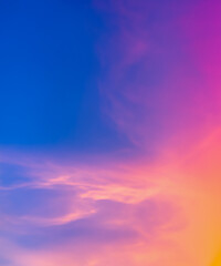 Fototapeta premium Sky midday sunlight beams rainbow pastel gradient pale orange-pink purple-blue dramatic. Beautiful sunny day soft light clouds blur background