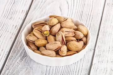 Salted tasty pistachio nuts heap