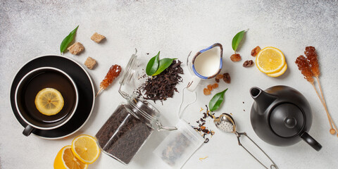Tea composition on light grey background. Flat lay. Top view. Banner