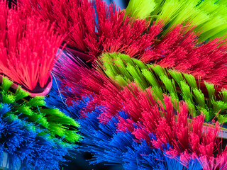 Colorful brush bristles arranged in groups