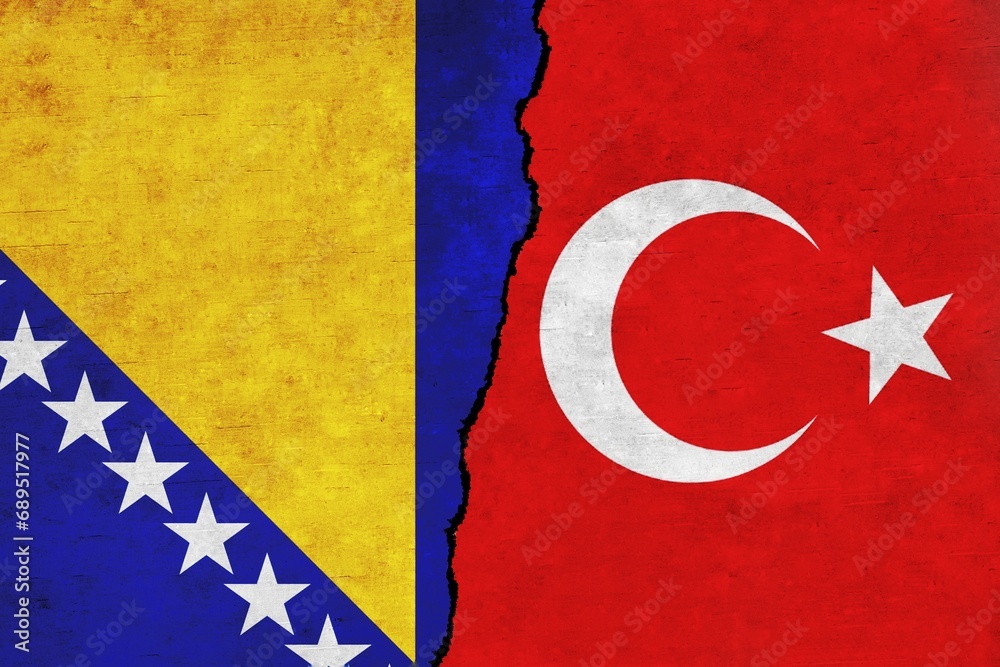 Wall mural turkey and bosnia and herzegovina painted flags on a wall with a crack. bosnia and herzegovina and t