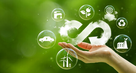businessman holding circular economy icon Circular economy concept for future business growth and environmental sustainability and reduce pollution for future business and environmental growth. - obrazy, fototapety, plakaty