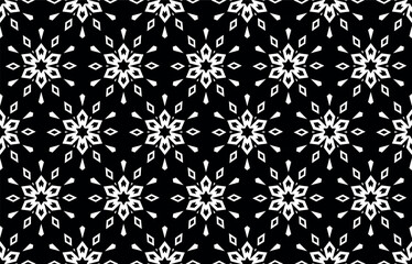 Fototapeta premium Abstract geometric pattern with lines, snowflakes. A seamless vector background. White and black texture. Graphic modern pattern.