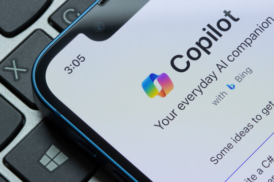Portland, OR, USA - Dec 5, 2023: Webpage of Microsoft Copilot is seen on an iPhone. Microsoft Copilot is a large language model-based chatbot developed by Microsoft Corporation.