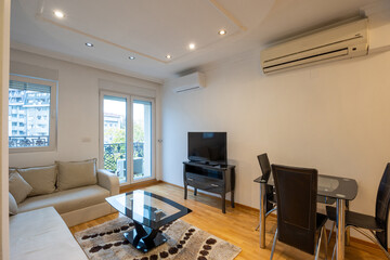Interior of an apartment living room with furniture