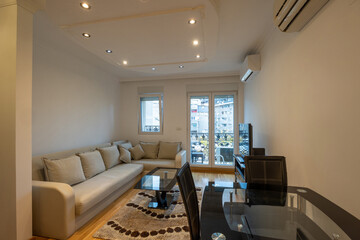 Open plan apartment interior with kitchen and dining space