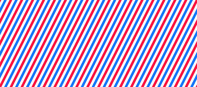 Barber shop pole background. Abstract diagonal line seamless pattern. Striped repeating wallpaper. Red, white and blue repeating texture. Vector wrapping paper backdrop