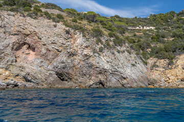 cliffs at Cala del Gesso cove, Argentario, Italy