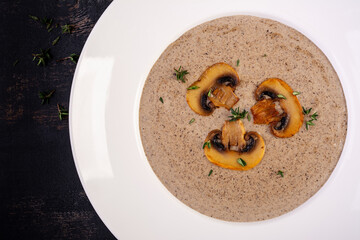 Mushroom cream soup. Vegan food. Dietary menu. Top view, flat lay.