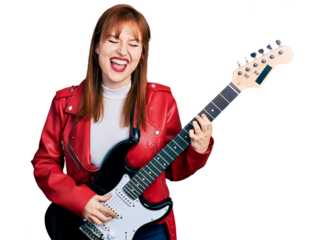 Redhead young woman playing electric guitar smiling and laughing hard out loud because funny crazy joke.