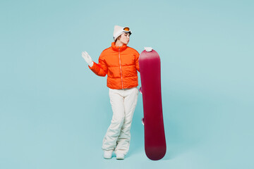 Full body young cool fun woman wear warm padded windbreaker jacket hat ski goggles mask hold pov...
