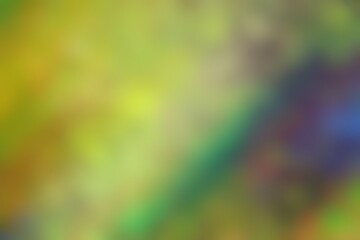 Abstract blurred background image of green, orange, yellow colors gradient used as an illustration. Designing posters or advertisements.