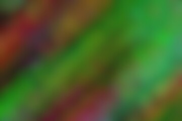 Abstract blurred background image of red, green colors gradient used as an illustration. Designing posters or advertisements.