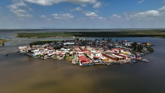 Aerial view circling the Mexcaltitan Magic Town, sunny day in Nayarit, Mexico