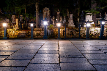 Stone lanterns in Okunoin cemetery - obrazy, fototapety, plakaty