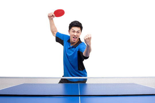 Chinese table tennis player cheers with fists balled