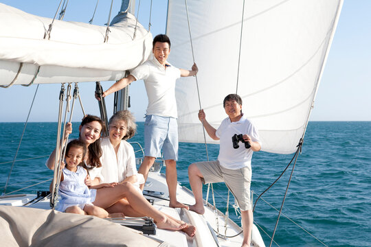 Happy multi-generation family on a sailboat