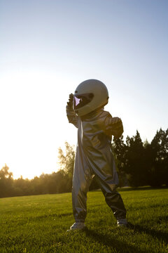 Young boy playing astronaut