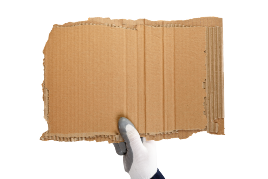 A worker's hand in a glove and a blue jacket is holding a piece of cardboard. Isolated on a white background.Strike.