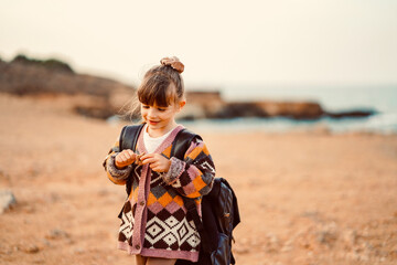 portrait of a child on the beach in cyprus