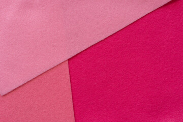 重なるピンク色のフェルト素材