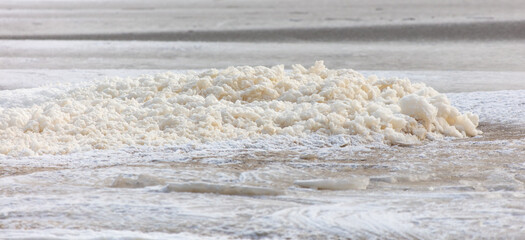 White foam on the river as a background