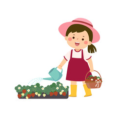 Little girl holding watering can and watering strawberry bushes. - 689583121